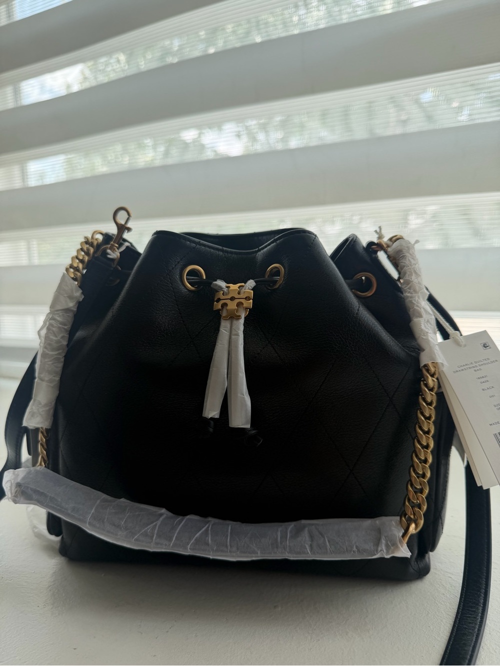 Black Quilted Shoulder Bucket Bag with Gold Chain Trim